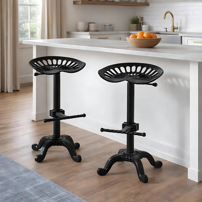Black metal Dine and Dwell Norwich adjustable tractor bar stool with a modern design and ergonomic seat.