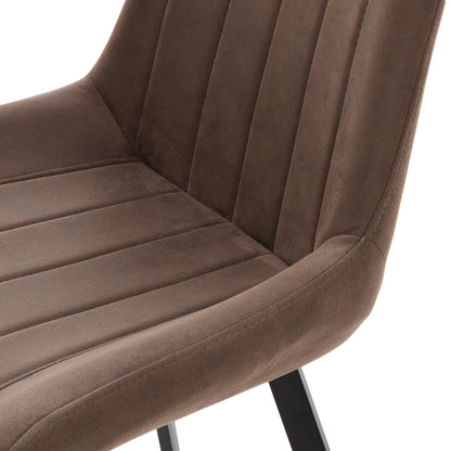 Dine and Dwell Wareham Coffee Dining Chair with leather-effect fabric, channel stitching, and black metal legs.