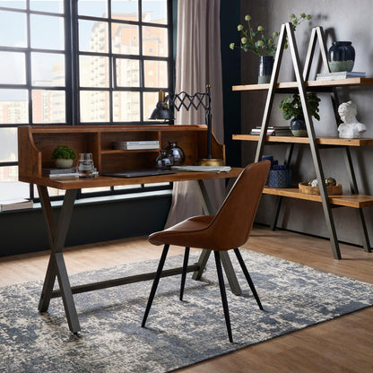 Wareham Tan Dine and Dwell dining chair with faux leather, channel stitching, and black metal legs, showcasing a modern, stylish design.