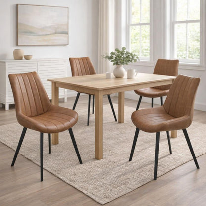 Wareham Tan Faux Leather Dining Chair with channel stitching and black metal legs from Dine and Dwell.