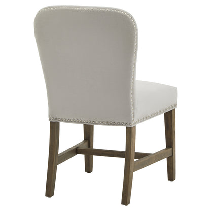 Winchester grey upholstered dining chair with oak frame and brass studding, modern Dine and Dwell furniture for stylish dining rooms