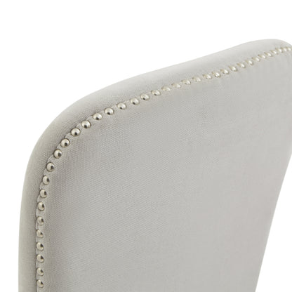 Winchester grey upholstered dining chair with oak frame and brass studding, stylish Dine and Dwell dining room seating