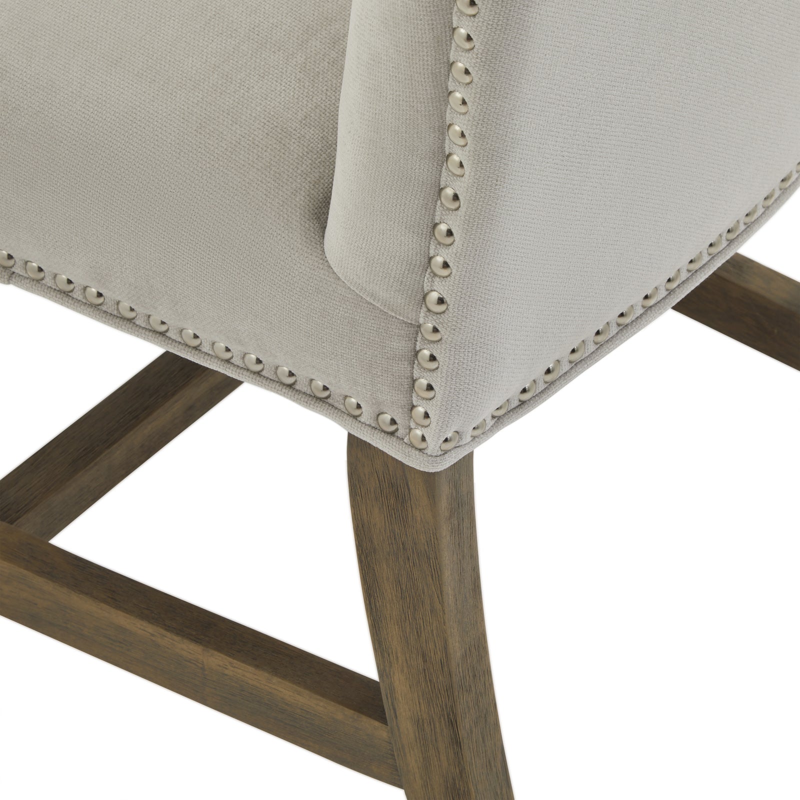 Winchester grey upholstered dining chair with oak frame and brass studding, stylish Dine and Dwell furniture for dining rooms.
