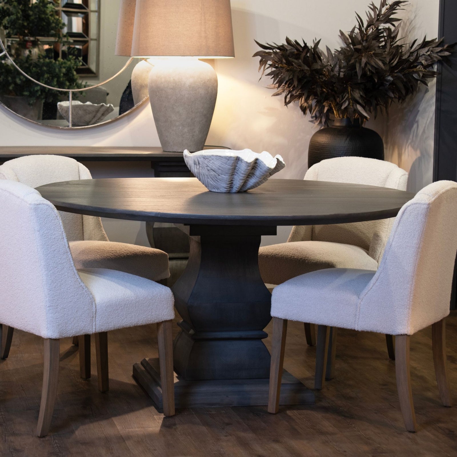 Cream upholstered Dine and Dwell Bristol Boucle Dining Chair with wooden legs, stylish and comfortable for dining rooms.
