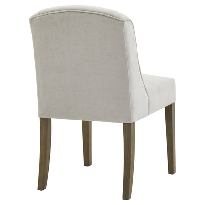 Grey upholstered Dine and Dwell Bristol dining chair with wooden legs, showcasing a comfortable, modern design.