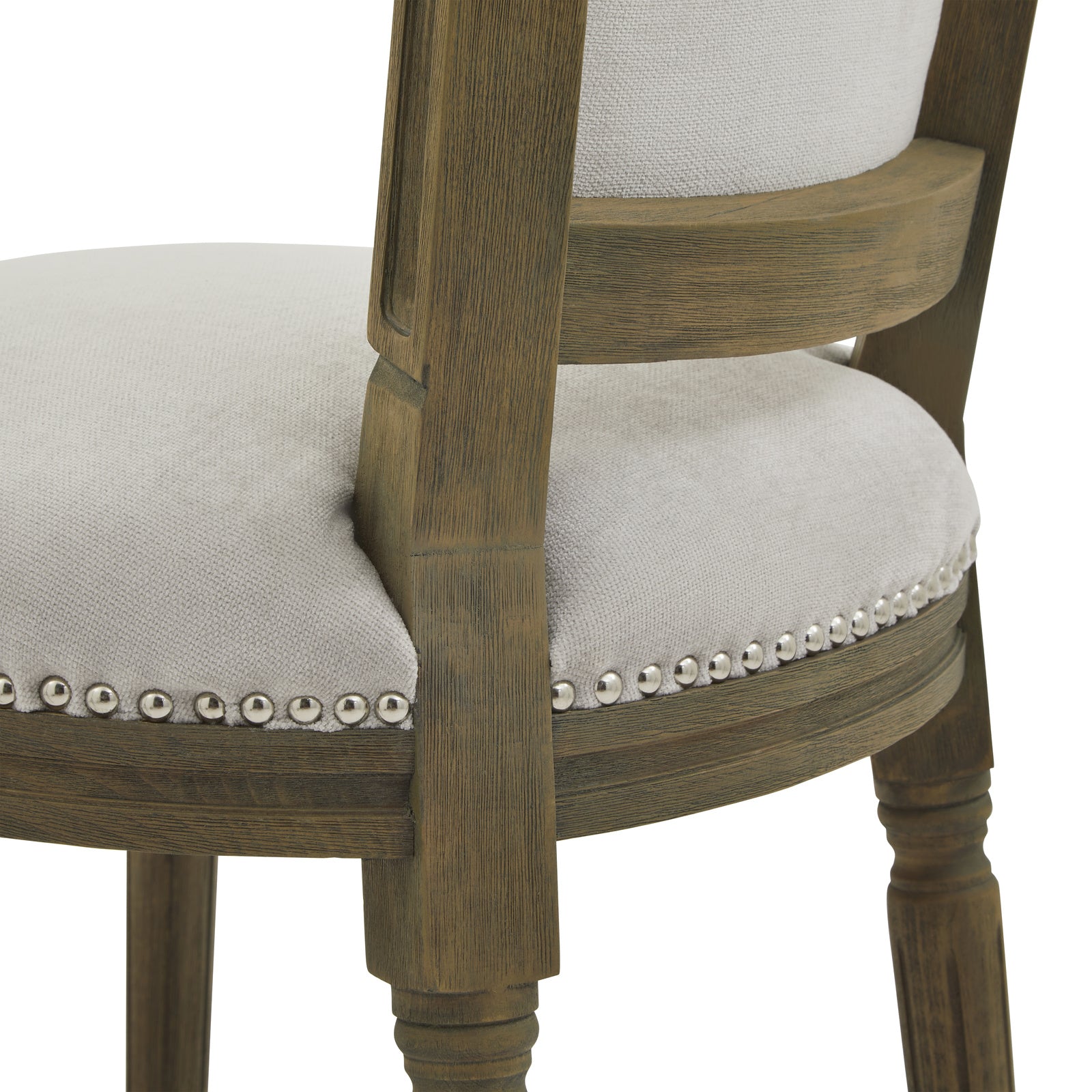 Grey upholstered Dine and Dwell Cambridge dining chair with wooden legs, showcasing a stylish and comfortable seating option.