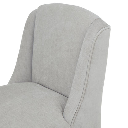 Dine and Dwell Bristol grey upholstered fabric and wood bar stool with a modern design and sturdy wooden legs.