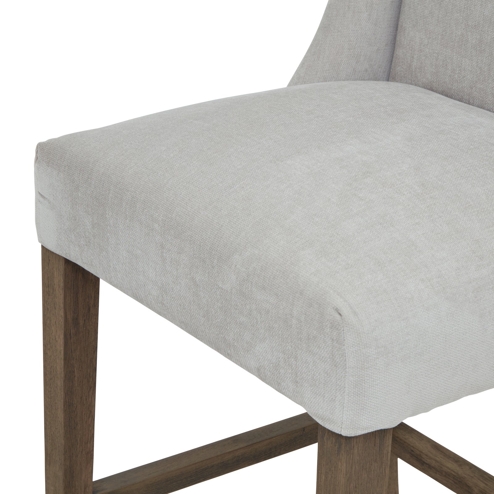 Grey upholstered Dine and Dwell Bristol bar stool with wooden legs and modern design, shown from a side angle.