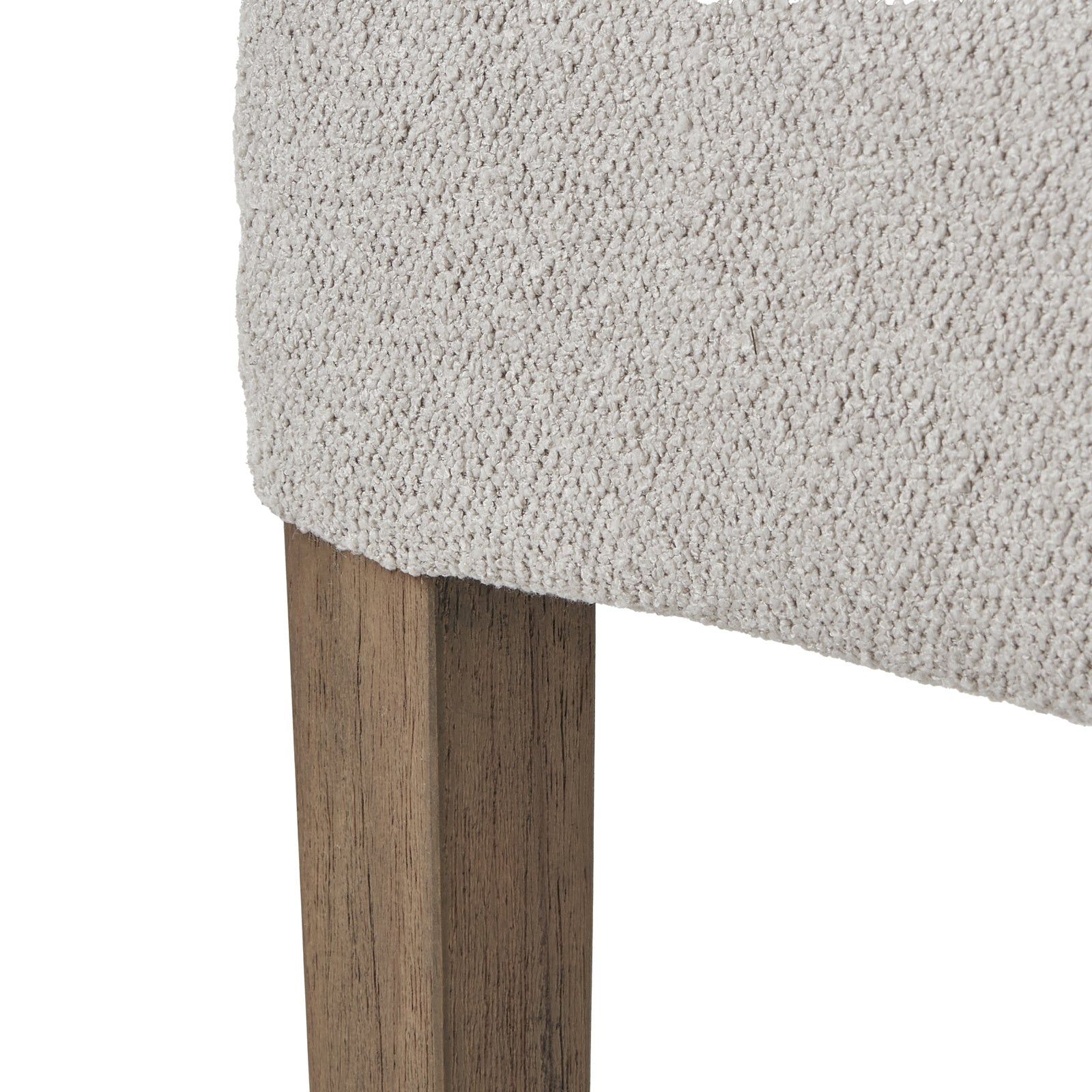 Grey upholstered Dine and Dwell Bristol Aspen dining chair with wooden legs, showcasing a modern and comfortable design.