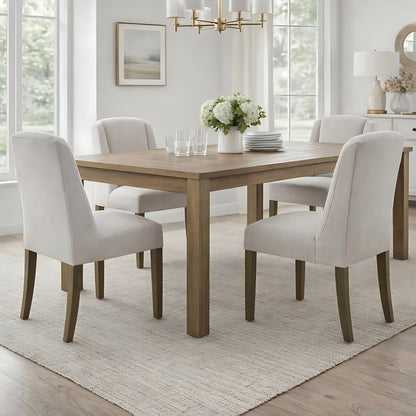 Grey upholstered Dine and Dwell Bristol Aspen dining chair with wooden legs, showcasing a modern, comfortable design.