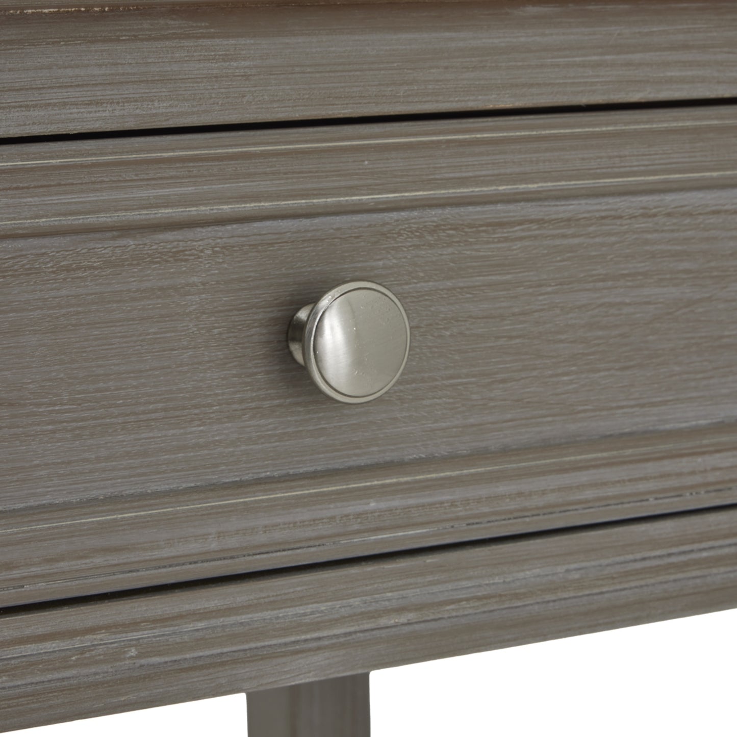 Dine and Dwell Ledbury grey distressed wood sideboard with four drawers and sleek metal handles, ideal for modern living spaces.