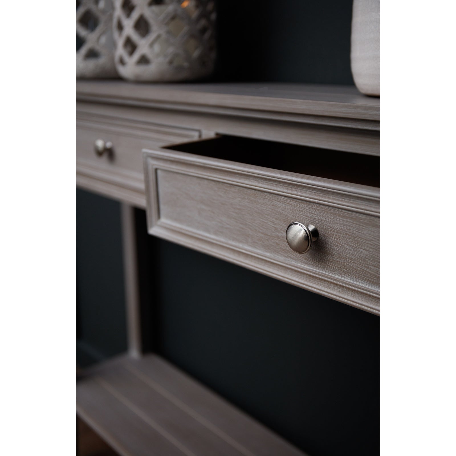 Dine and Dwell Ledbury grey distressed wood sideboard with four drawers, showcasing a rustic console table design.