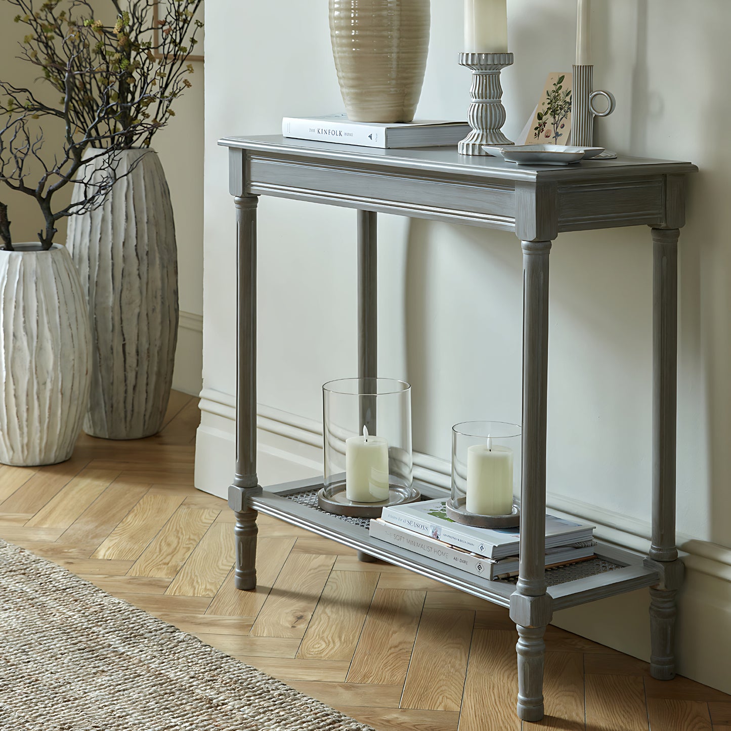 Dine and Dwell Ledbury rattan sideboard with grey washed wood finish, featuring a console table design and natural rattan accents.