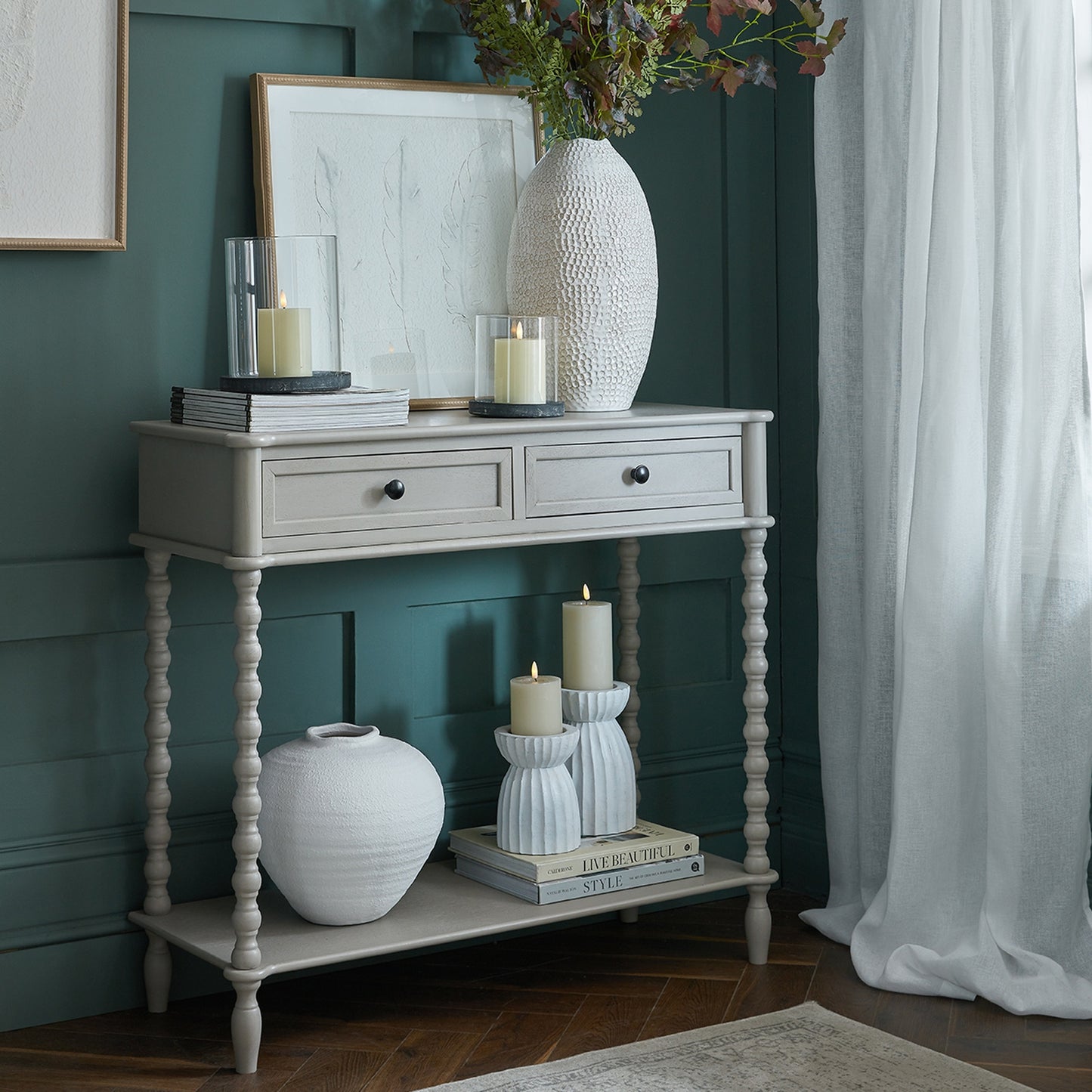 Dine and Dwell Lavenham brown solid wood sideboard with two drawers, showcasing its classic design and sturdy construction.