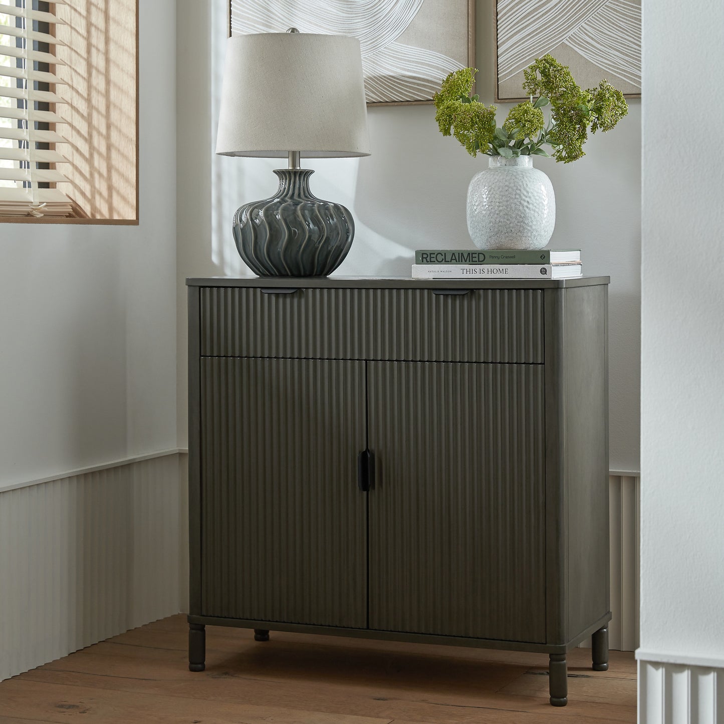 Dine and Dwell Shrewsbury brown wood cabinet with one drawer and two doors, featuring a classic design and sturdy construction.