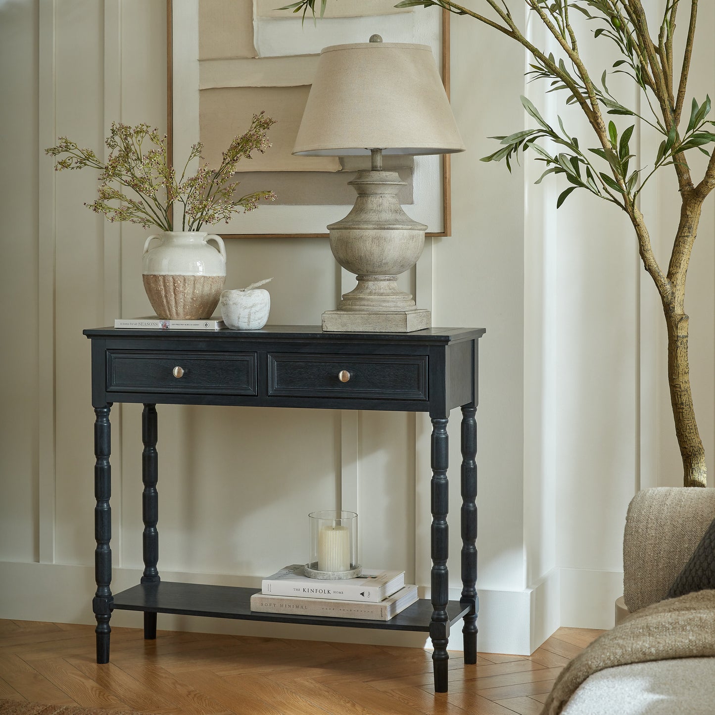 Black wood Dine and Dwell Bidbury 2-drawer console table, a stylish sideboard with modern design and functional storage.