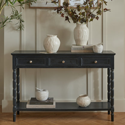 Dine and Dwell Bidbury black wood sideboard with three drawers and sleek design, ideal for dining or living room storage.