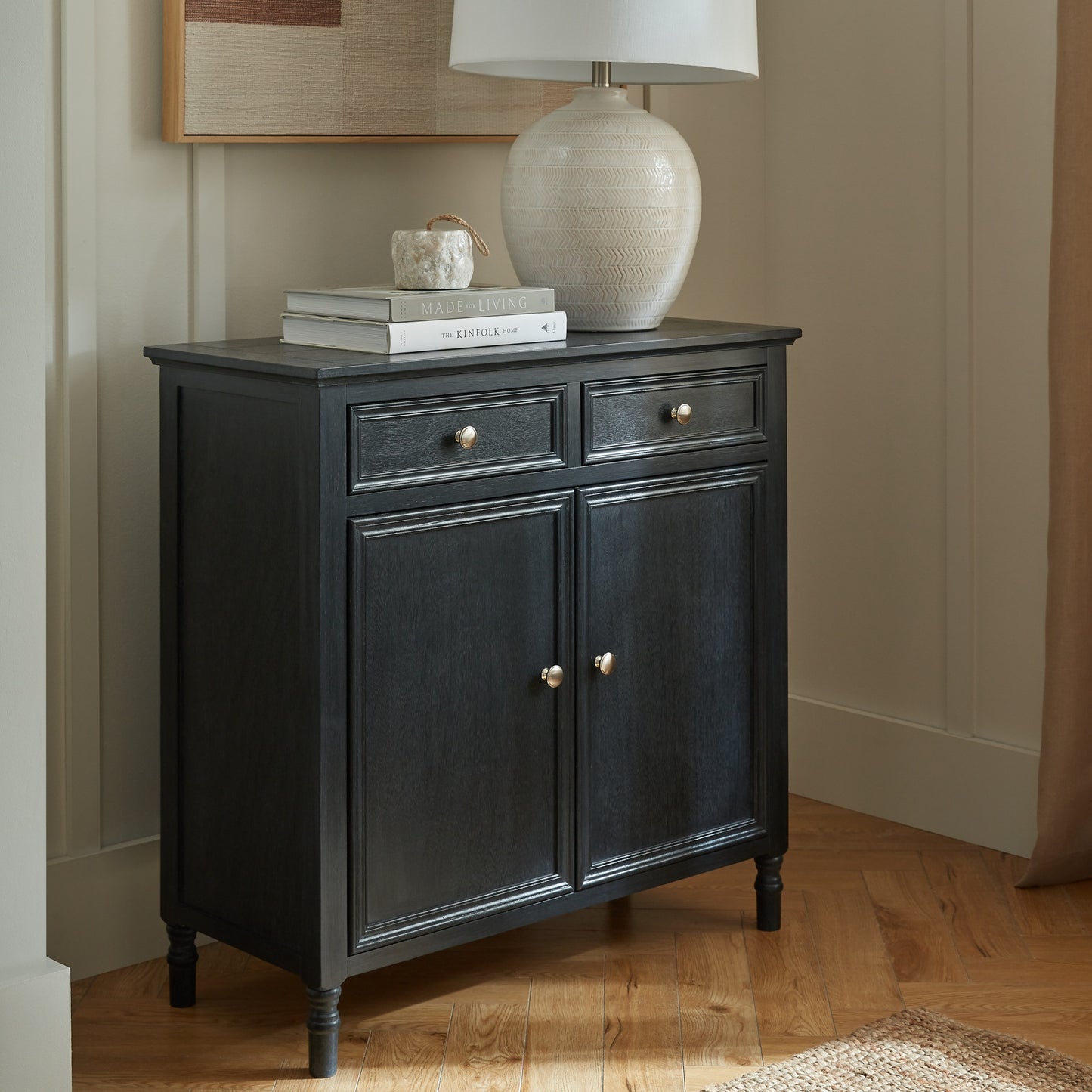 Black wood Dine and Dwell Bidbury 2 drawer 2 door sideboard with sleek design and modern hardware.