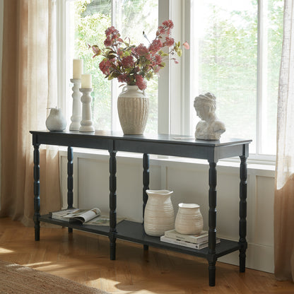 Black wood Dine and Dwell Bidbury large console sideboard with sleek design and spacious tabletop for stylish storage.