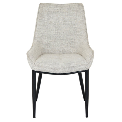 Upholstered Worcester dining chair by Dine and Dwell with oatmeal fabric and black metal legs, showcasing a stylish armchair design.