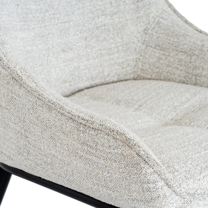 Worcester dining chair by Dine and Dwell with upholstered oatmeal fabric and black metal legs, ideal for modern dining rooms.