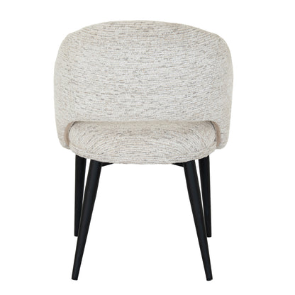 White upholstered Dine and Dwell Sandwell curved dining chair with black metal legs, modern and stylish for dining room decor.