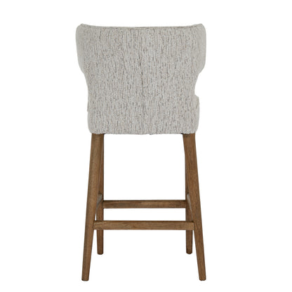 Dine and Dwell Derby upholstered bar stool with mist fabric seat and wooden legs, modern and stylish for kitchen or bar area.