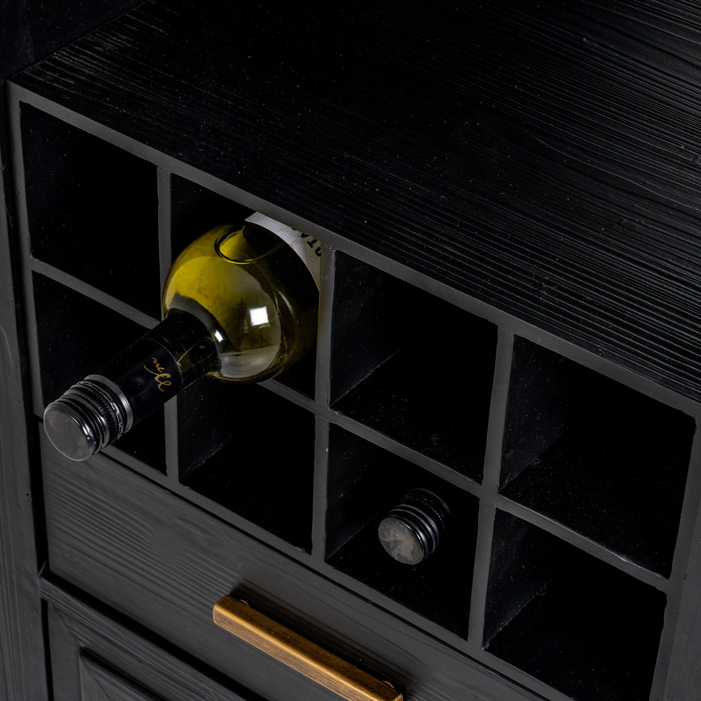 Dine and Dwell Lincoln drinks cabinet in matte black wood with glass doors and storage shelves for bottles and glassware.