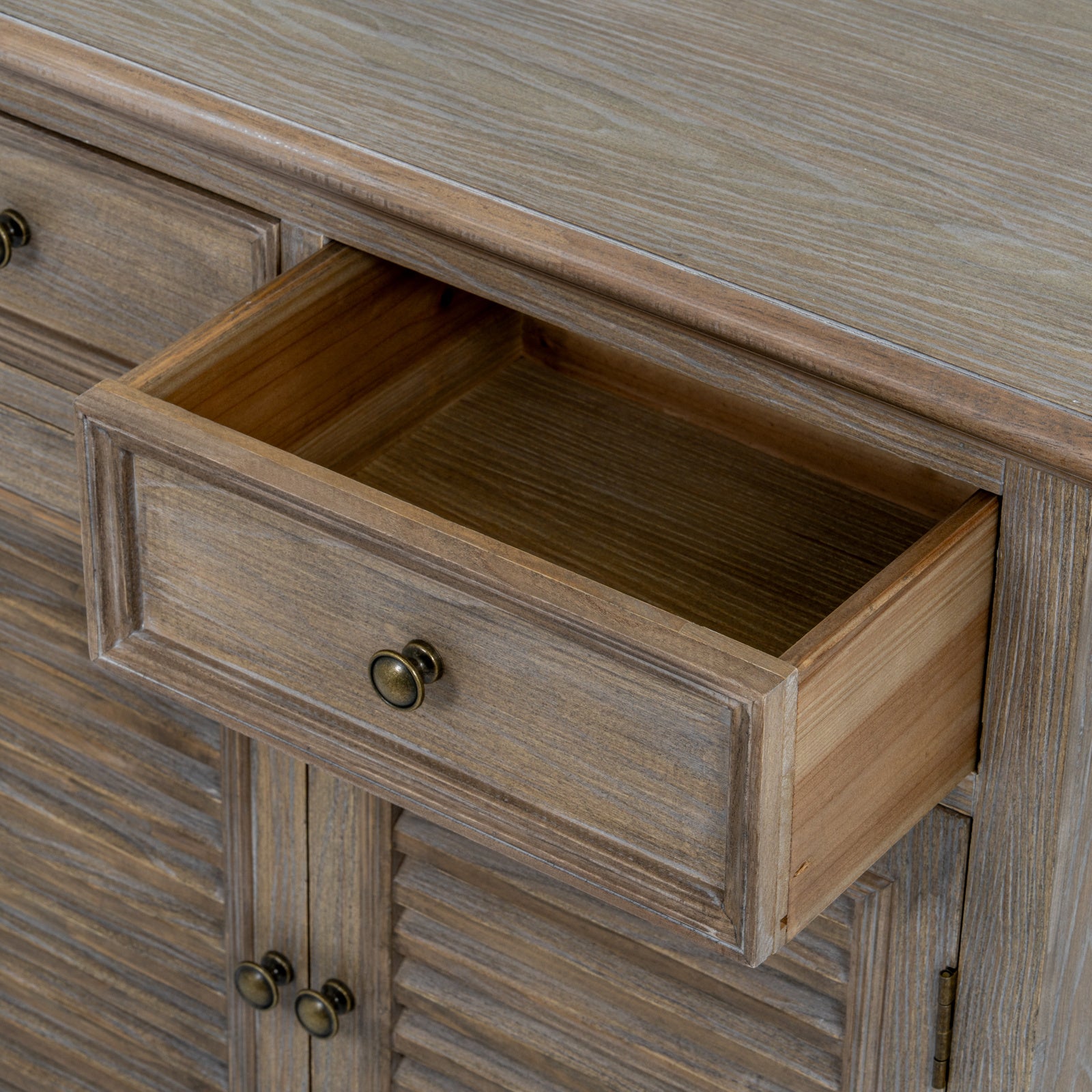 Dine and Dwell Leamington brown wood cabinet with two drawers and two doors, offering stylish storage for living or dining room.