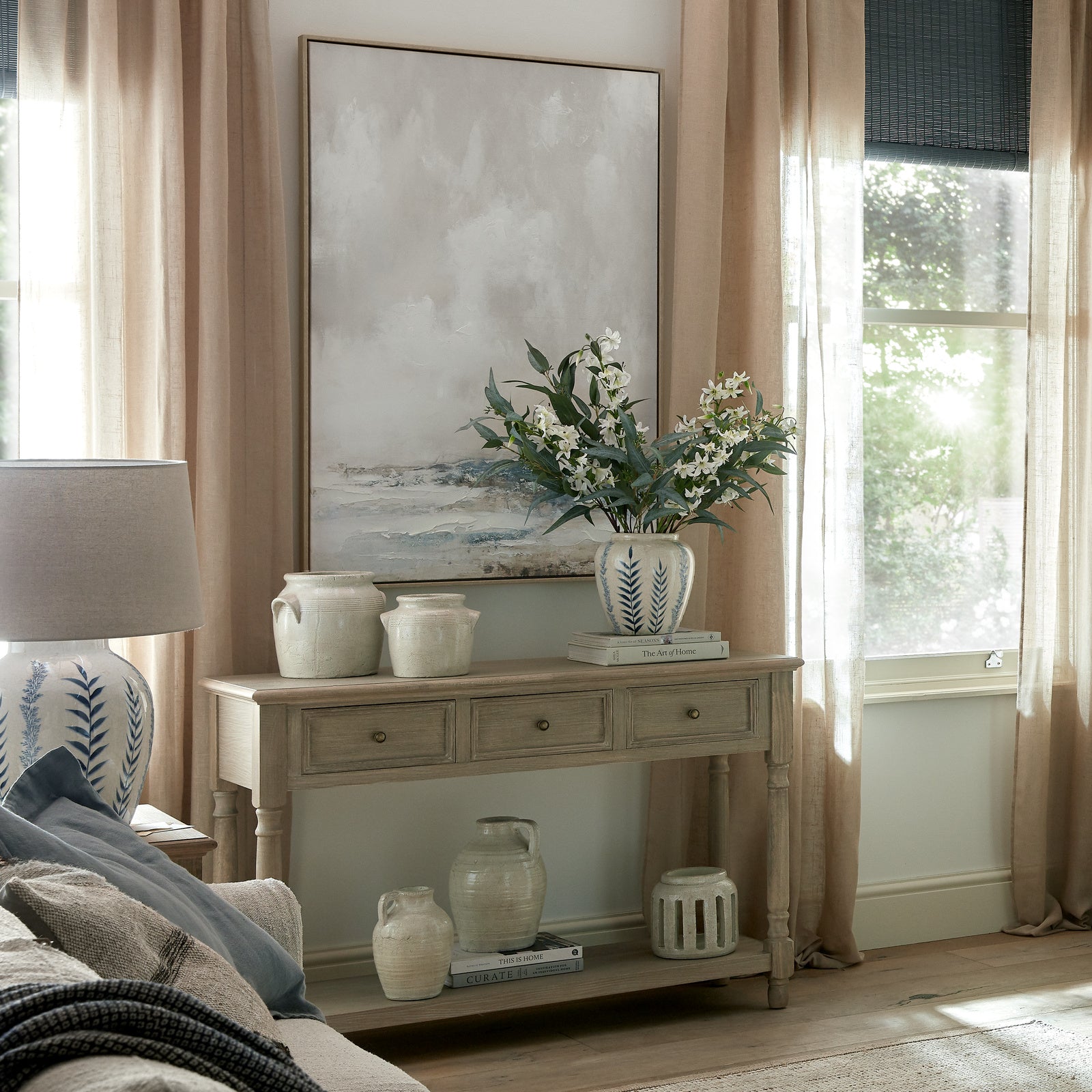 Dine and Dwell Leamington brown wood sideboard with 3 drawers and a shelf, modern console table for living or entryway.