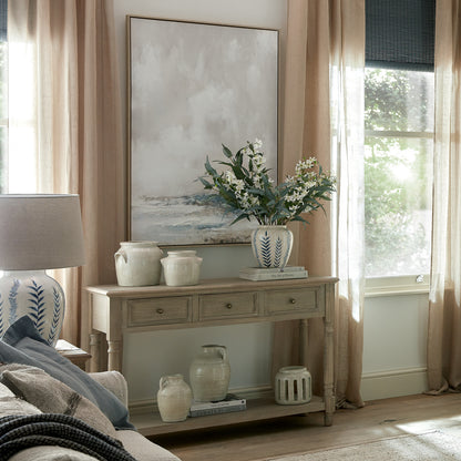 Dine and Dwell Leamington brown wood sideboard with 3 drawers and a shelf, modern console table for living or entryway.