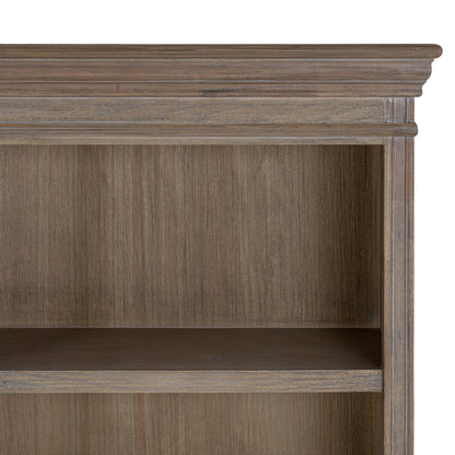 Dine and Dwell Leamington large brown wood sideboard with three shelves, serving as a stylish dresser top or storage unit.